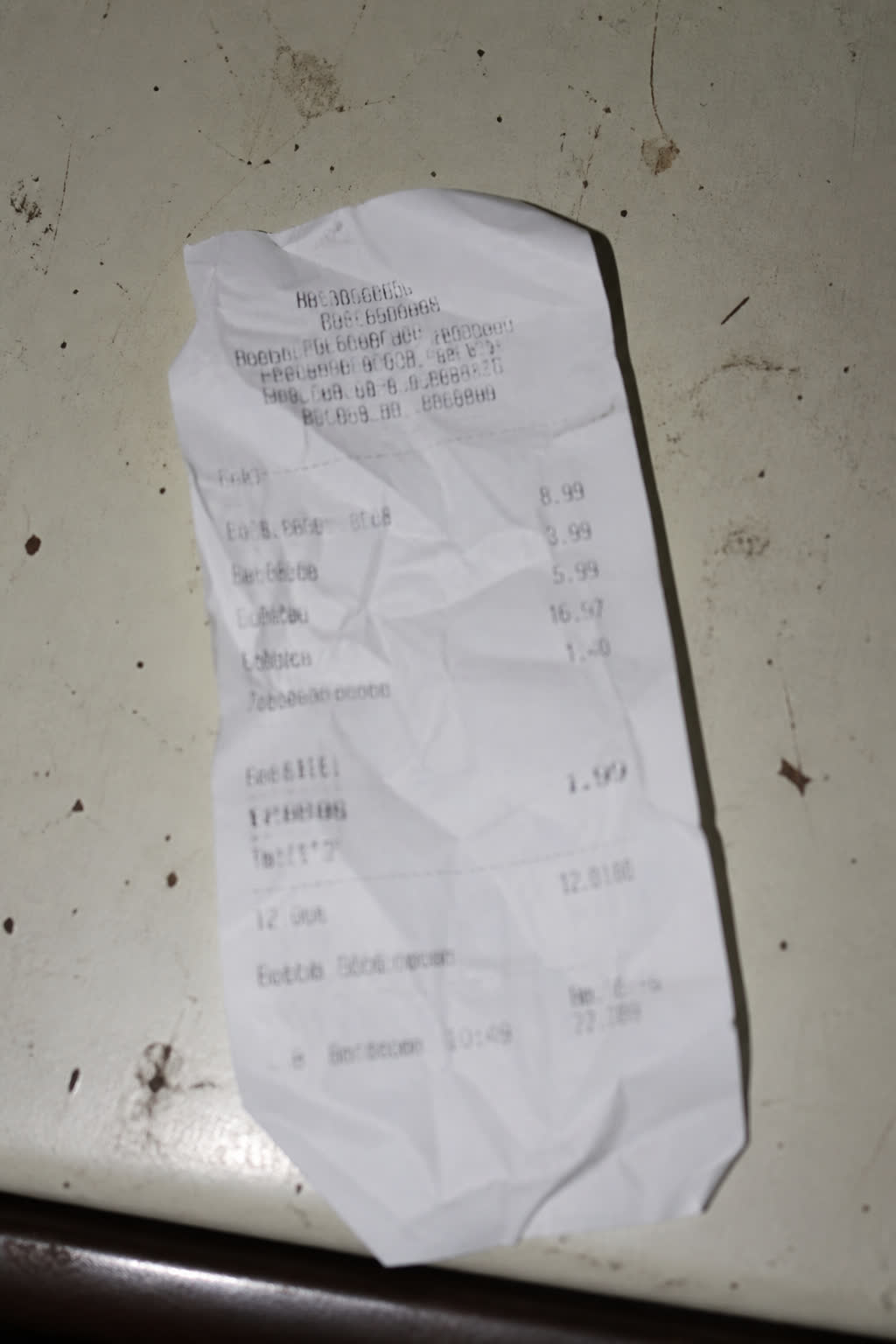 A crumpled receipt presented as evidence